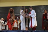 Pontius Pilate (Lee Azevedo) washes his hands, with the help of the Roman servers.